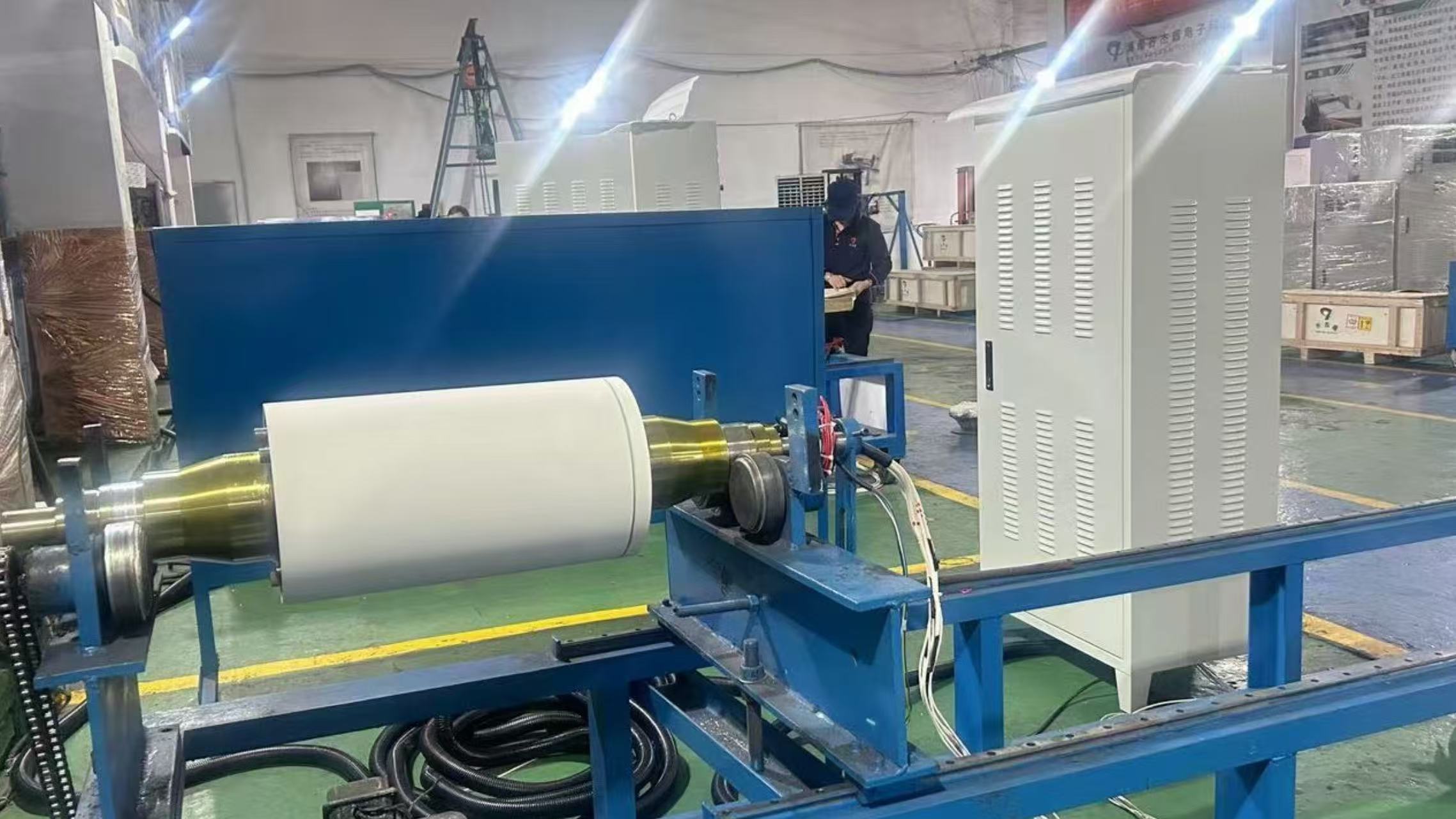 Electromagnetic heating rubber roller - temperature adjustment in progress